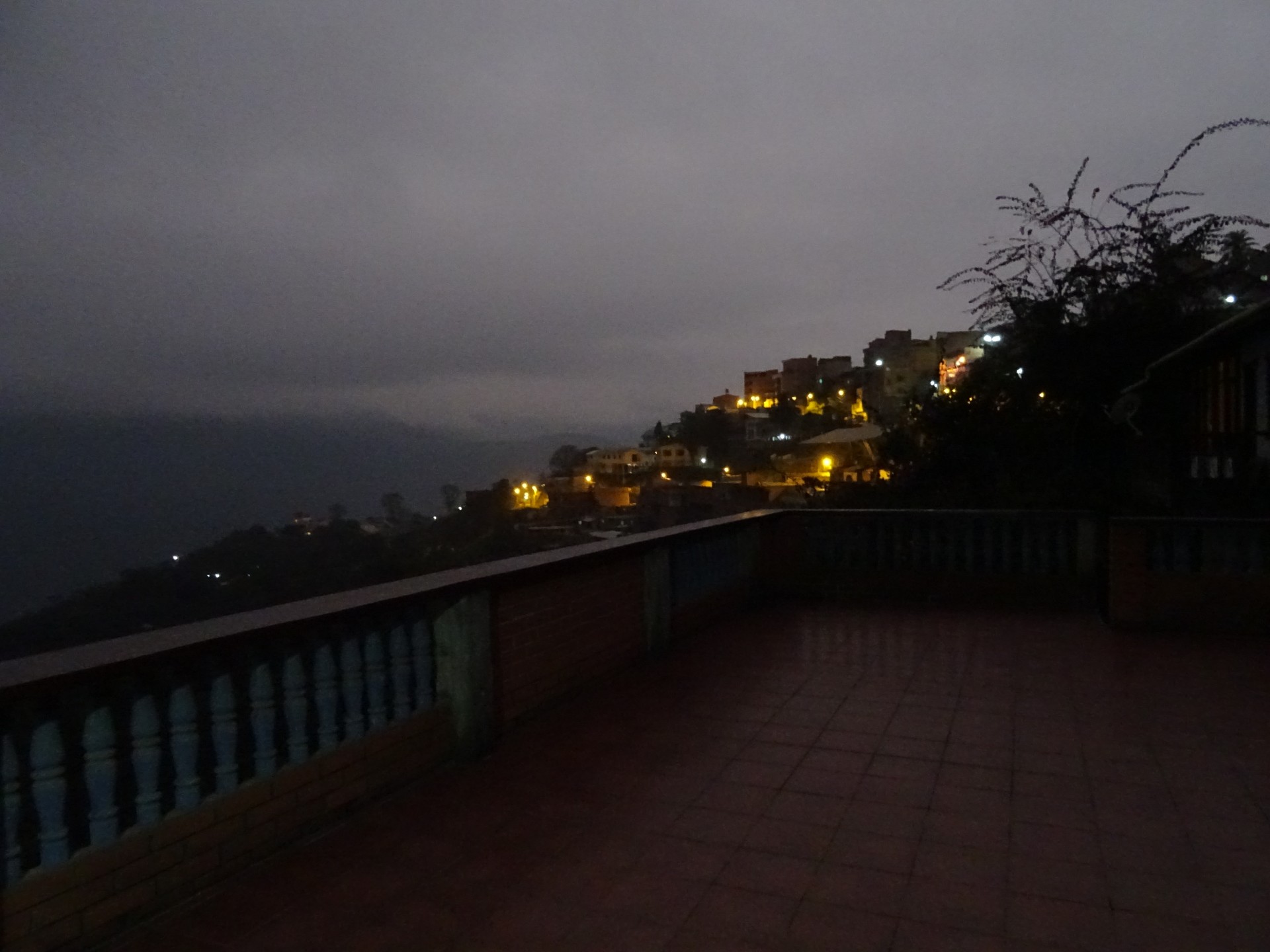 Coroico in the early hours. It's cold, wet and dark.